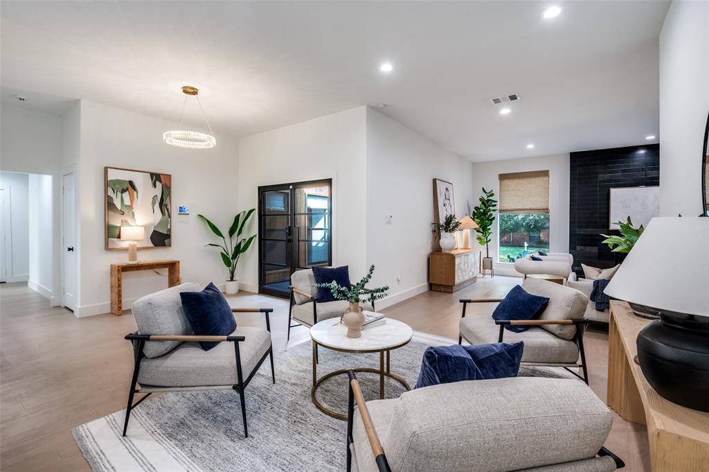 6322 Pineview Road Dallas, TX 75248 - Photo 3 of 40 a living room with furniture and a wooden floor