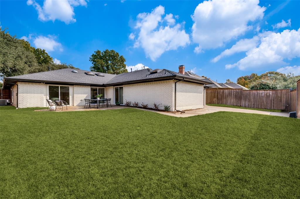 6322 Pineview Road Dallas, TX 75248 - Photo 39 of 40 a front view of house with yard and trees