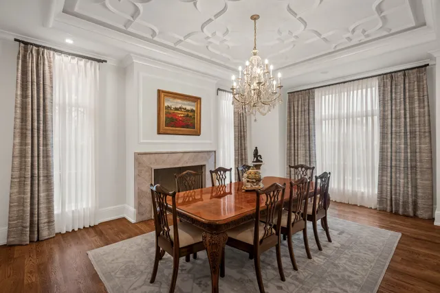 a view of living room with furniture and wooden floor