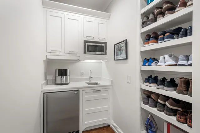 a view of entryway with wooden floor
