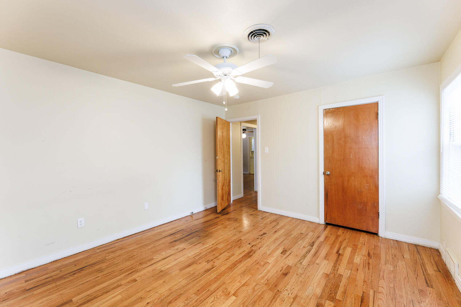 3501 26th Street Lubbock, TX 79410 - Photo 26 of 36 a view of empty room with wooden floor