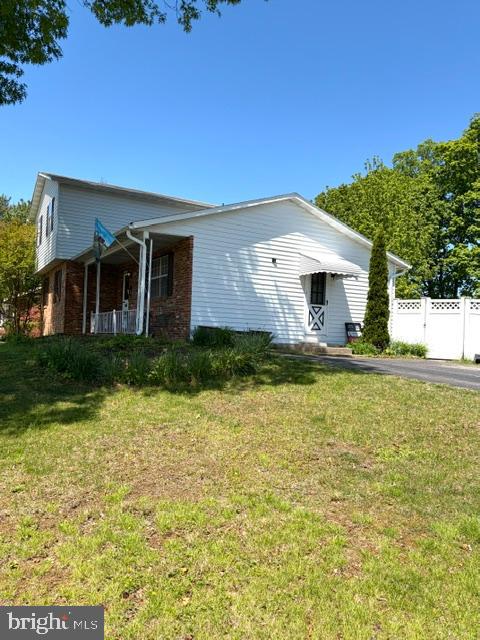 108 Kingbrook Road Linthicum Heights, MD 21090 - Photo 2 of 15 a front view of house with yard