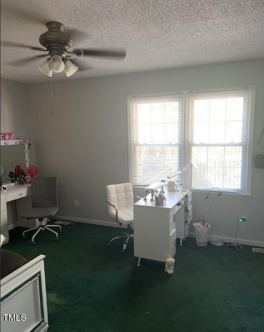4001 Pickwick Drive Raleigh, NC 27613 - Photo 5 of 5 a living room with furniture and a window