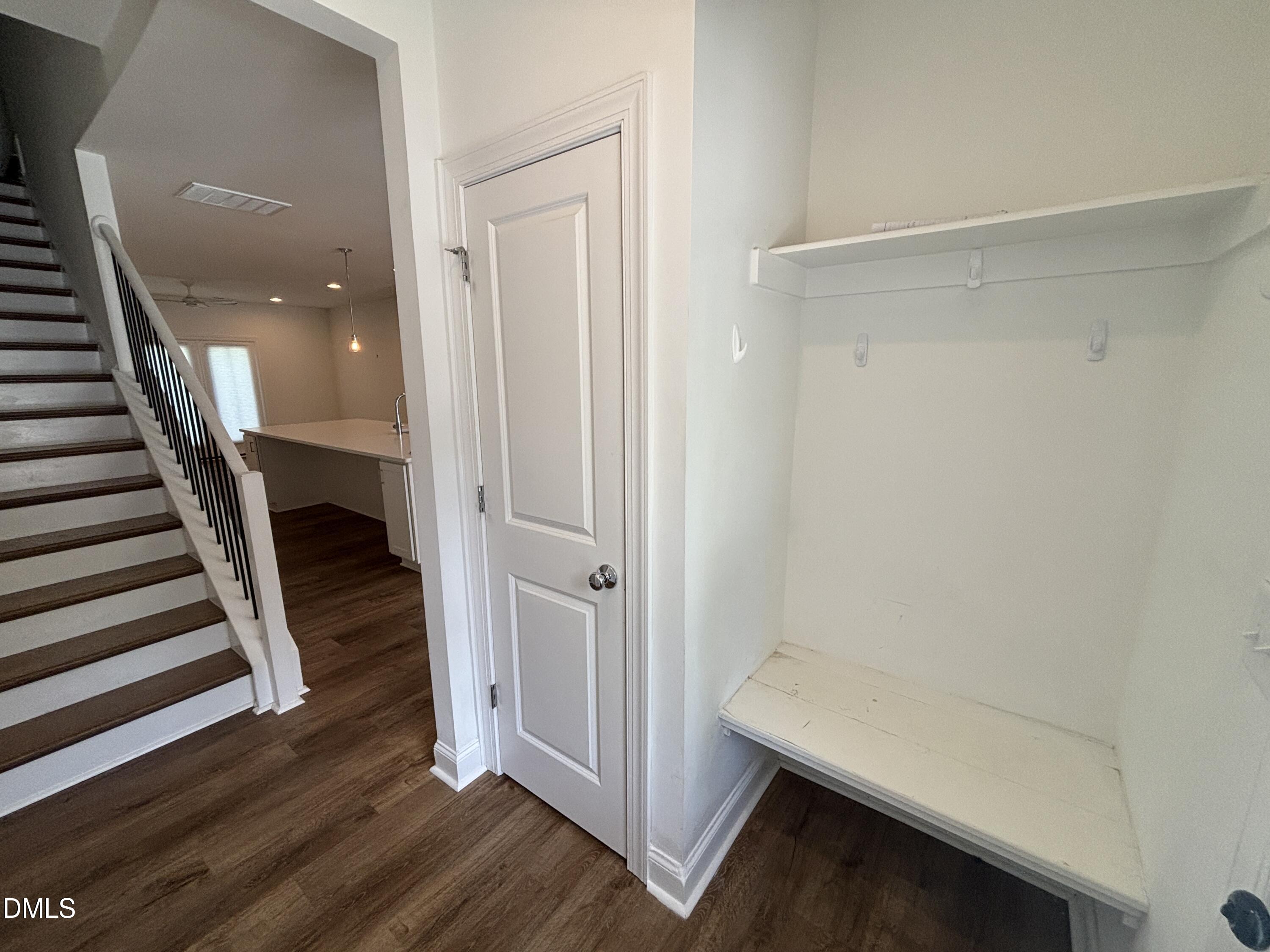 5710 Parker Pnes Court Raleigh, NC 27609 - Photo 10 of 78 a view of a hallway with wooden floor and entryway