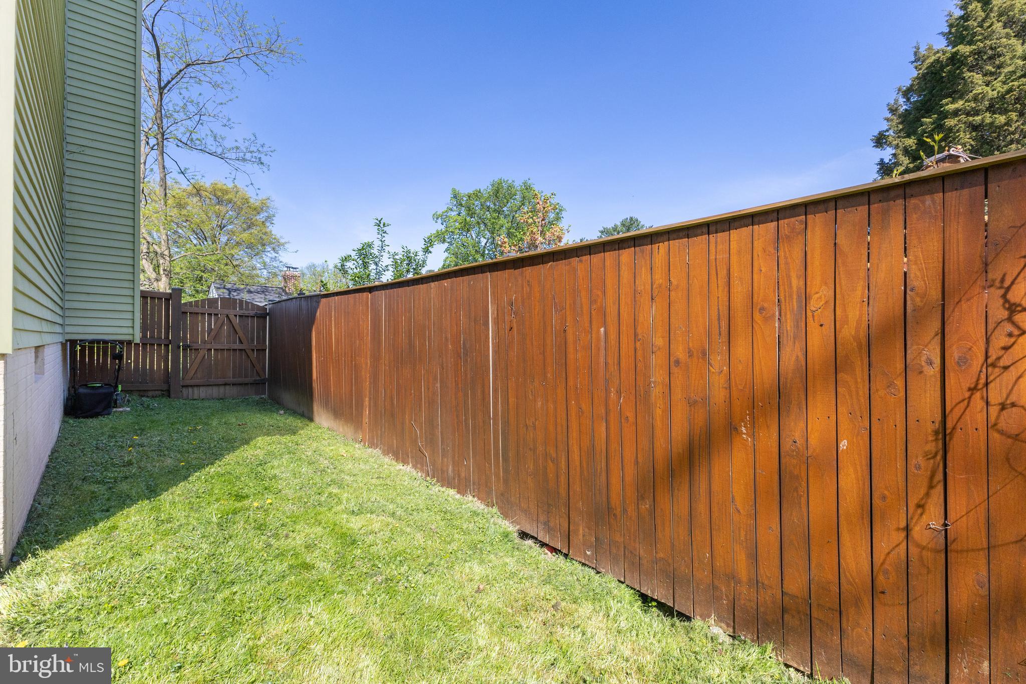 9705 Glen Avenue Silver Spring, MD 20910 - Photo 32 of 43 a view of a backyard with wooden fence