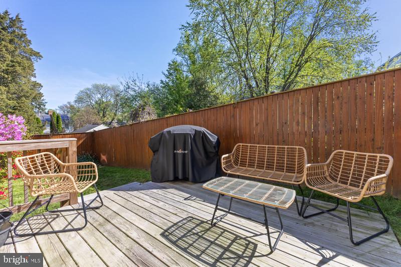 9705 Glen Avenue Silver Spring, MD 20910 - Photo 33 of 43 a view of a chairs and table on the deck