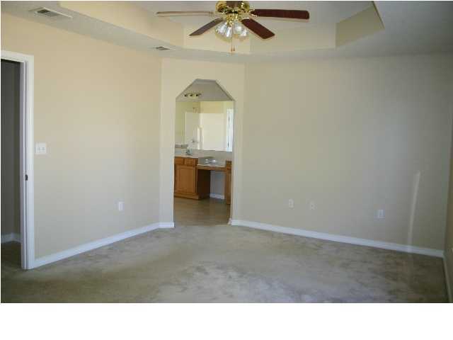 4481 Antioch Road Crestview, FL 32536 - Photo 12 of 21 a open space with a sink and a mirror