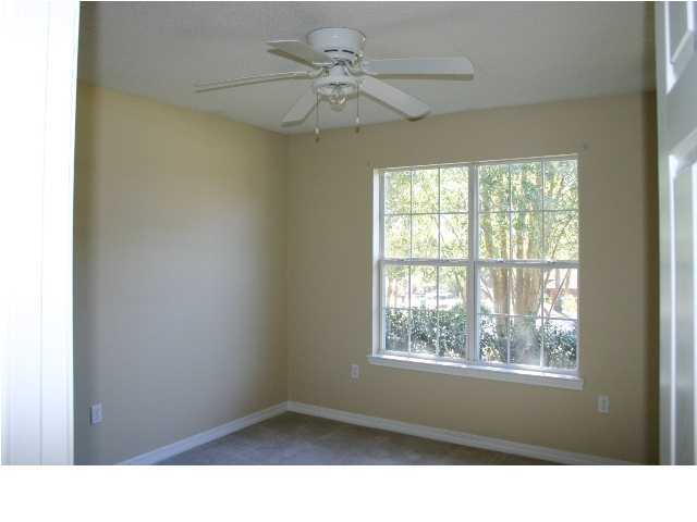 4481 Antioch Road Crestview, FL 32536 - Photo 18 of 21 a black and white wall with a window