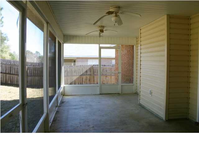 4481 Antioch Road Crestview, FL 32536 - Photo 19 of 21 a bathroom with a sink and a large window