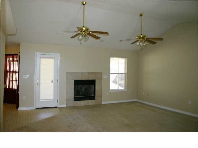 4481 Antioch Road Crestview, FL 32536 - Photo 2 of 21 a black and white room with a fireplace