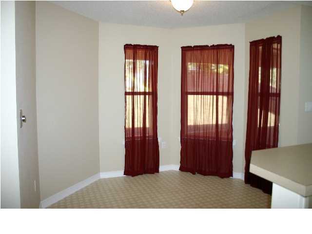 4481 Antioch Road Crestview, FL 32536 - Photo 9 of 21 a room with windows and closet