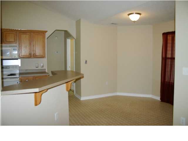 4481 Antioch Road Crestview, FL 32536 - Photo 10 of 21 a room with wooden floor