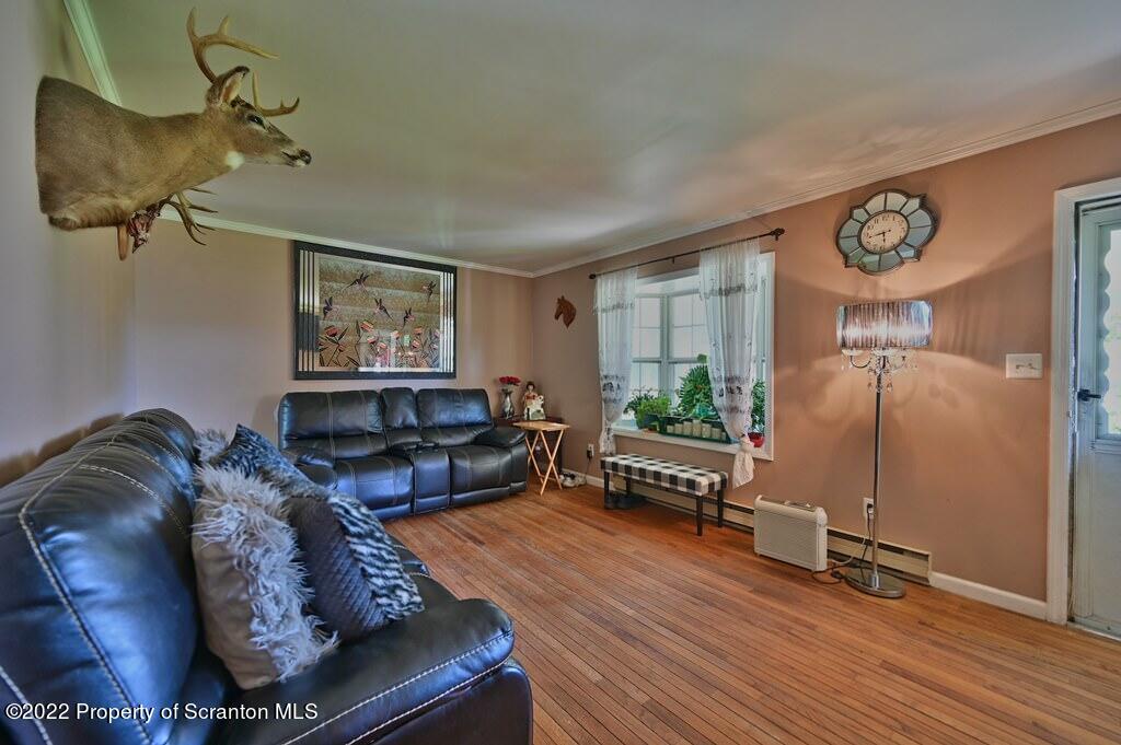 217 Hemlock Road Lake Ariel, PA 18436 - Photo 15 of 54 a living room with furniture rug and window