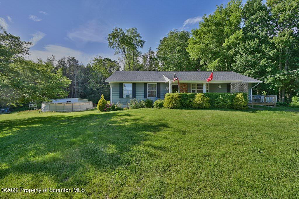 217 Hemlock Road Lake Ariel, PA 18436 - Photo 2 of 54 a front view of a house with a yard