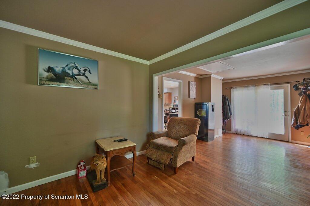 217 Hemlock Road Lake Ariel, PA 18436 - Photo 25 of 54 a living room with furniture and a wooden floor