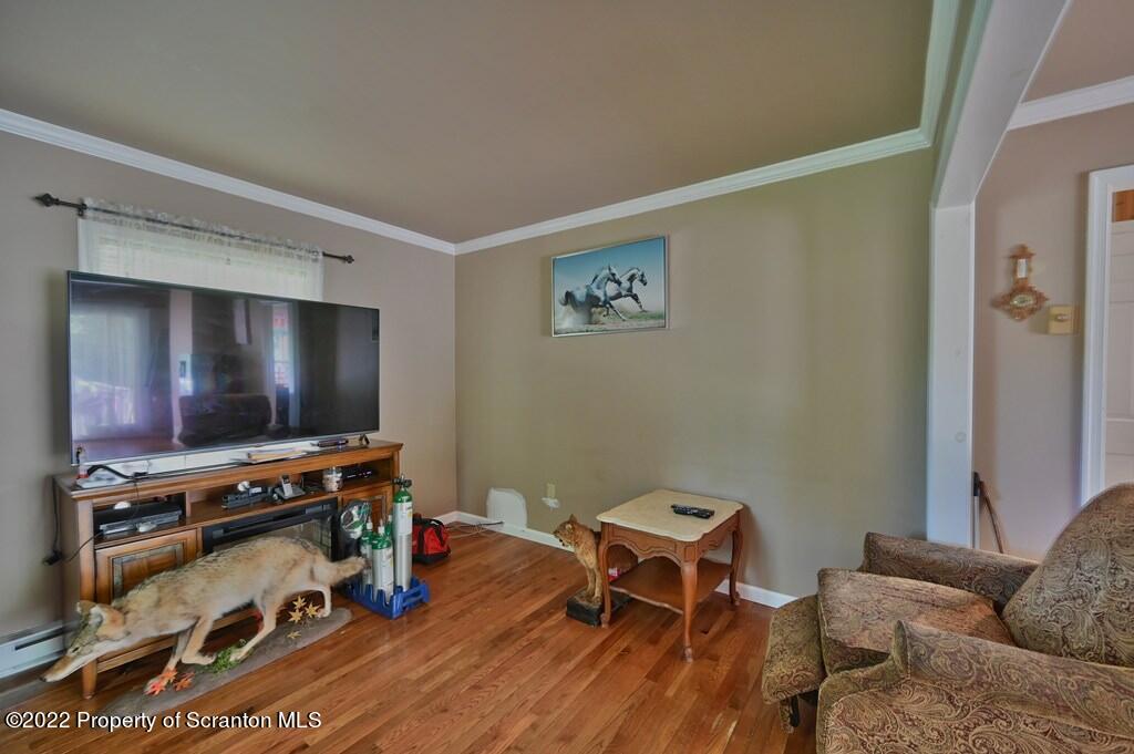 217 Hemlock Road Lake Ariel, PA 18436 - Photo 27 of 54 a living room with furniture and a flat screen tv