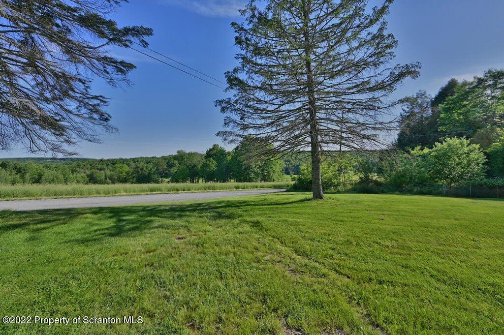 217 Hemlock Road Lake Ariel, PA 18436 - Photo 44 of 54 a view of a field of grass and trees