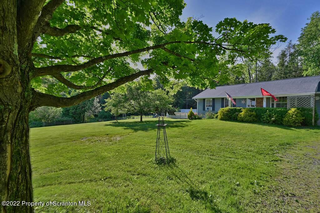 217 Hemlock Road Lake Ariel, PA 18436 - Photo 7 of 54 a house view with a outdoor space