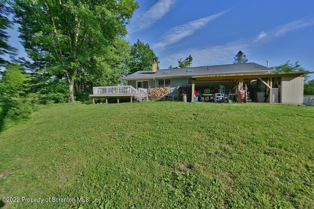 217 Hemlock Road Lake Ariel, PA 18436 - Photo 10 of 54 a front view of a house with garden