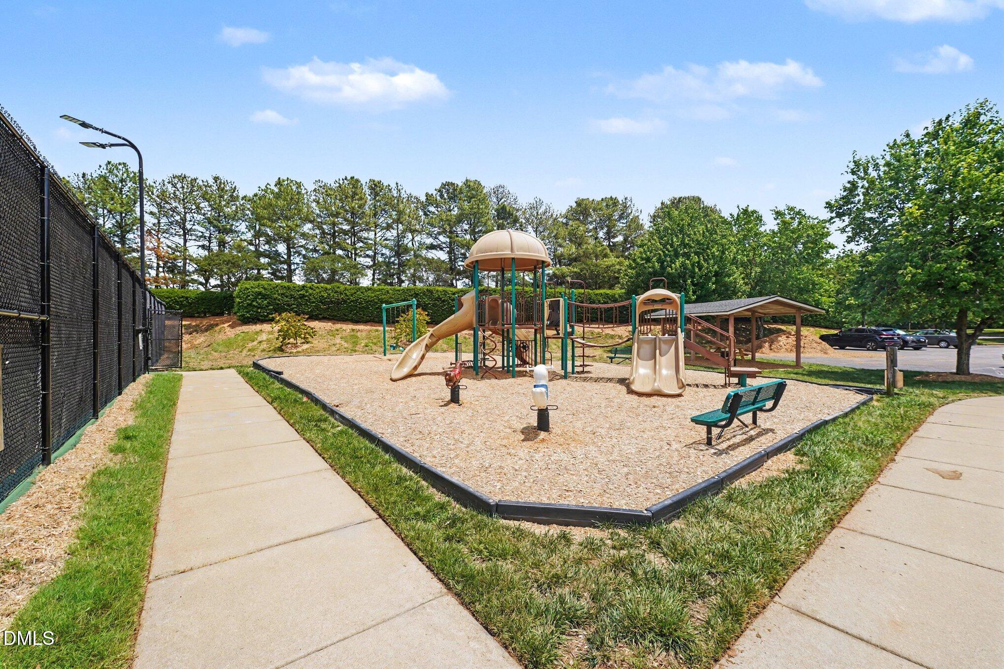 1130 Renewal Place, Unit 106 Raleigh, NC 27603 - Photo 30 of 34 a view of a swimming pool with a patio