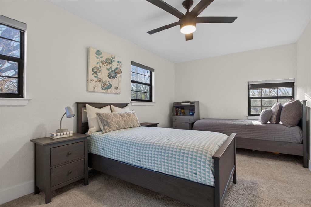 316 Old Justin Road Argyle, TX 76226 - Photo 29 of 40 Up the beautiful staircase, find this bedroom with closet and attic access.