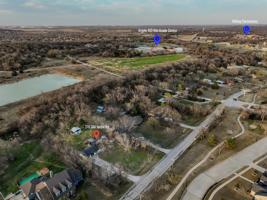 316 Old Justin Road Argyle, TX 76226 - Photo 39 of 40 . Nestled in the heart of Argyle & zoned for the sought-after Argyle ISD, including beloved Hilltop Elementary, this home beautifully blends the soul of country living with the ease of modern comfort.