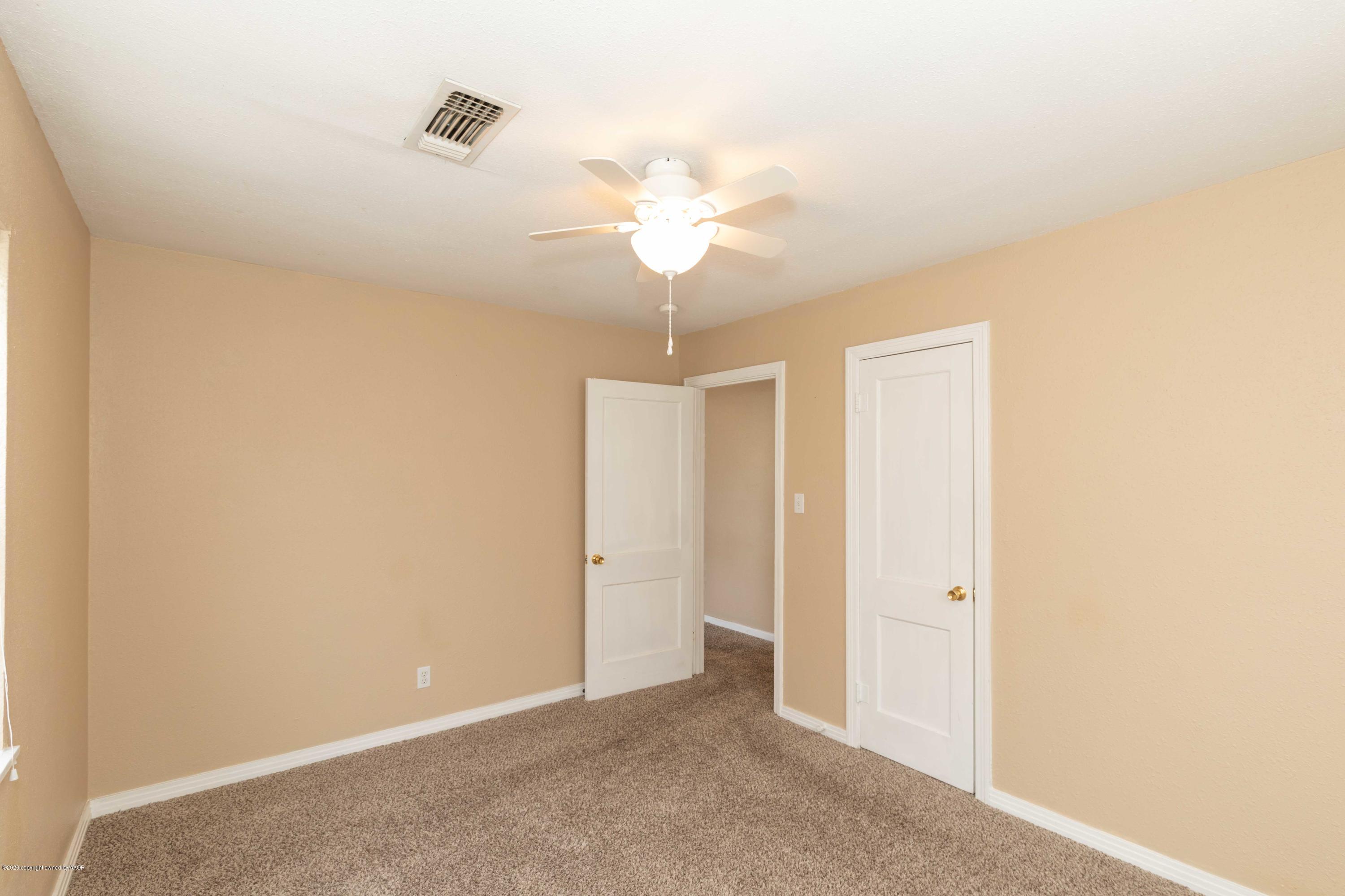 4361 South Tyler Street Amarillo, TX 79110 - Photo 20 of 30 a view of a chandelier fan in a room