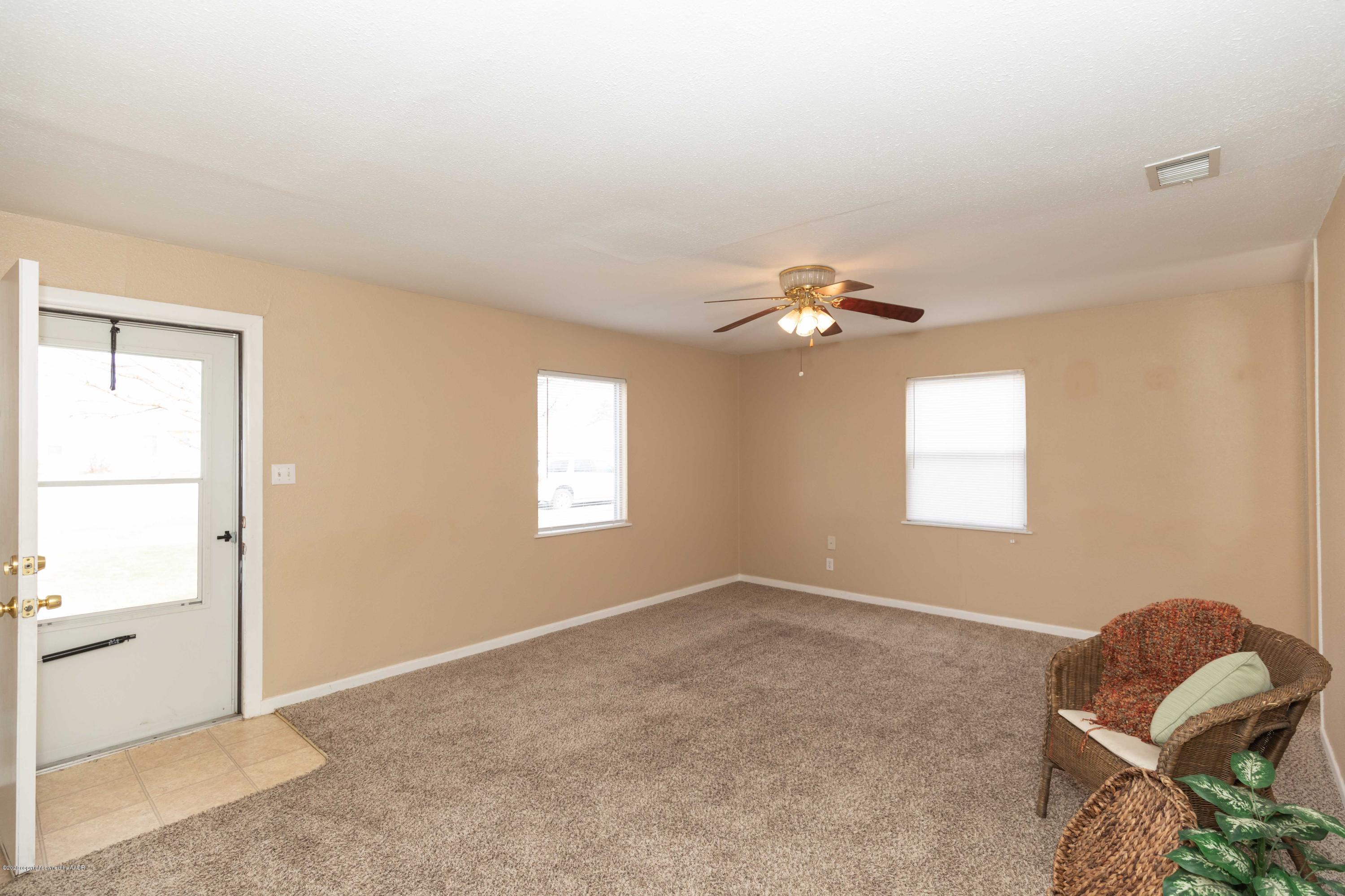 4361 South Tyler Street Amarillo, TX 79110 - Photo 5 of 30 a view of a livingroom with a window