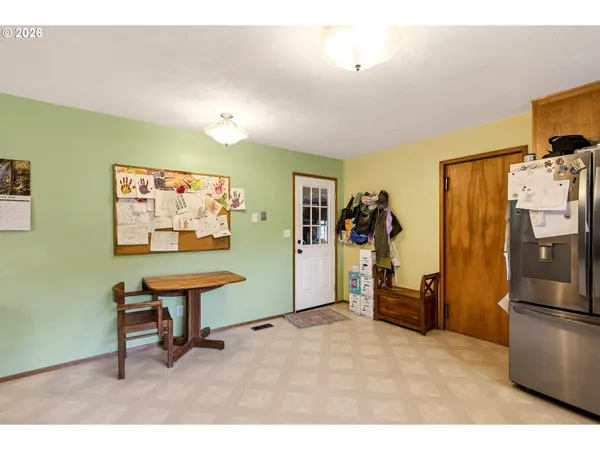 a view of a workspace with furniture