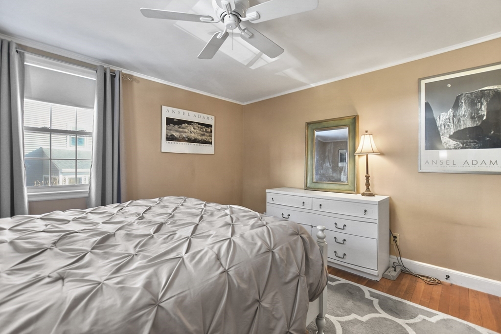 102 Channing Road Watertown, MA 02472 - Photo 25 of 40 a bedroom with a bed and a window