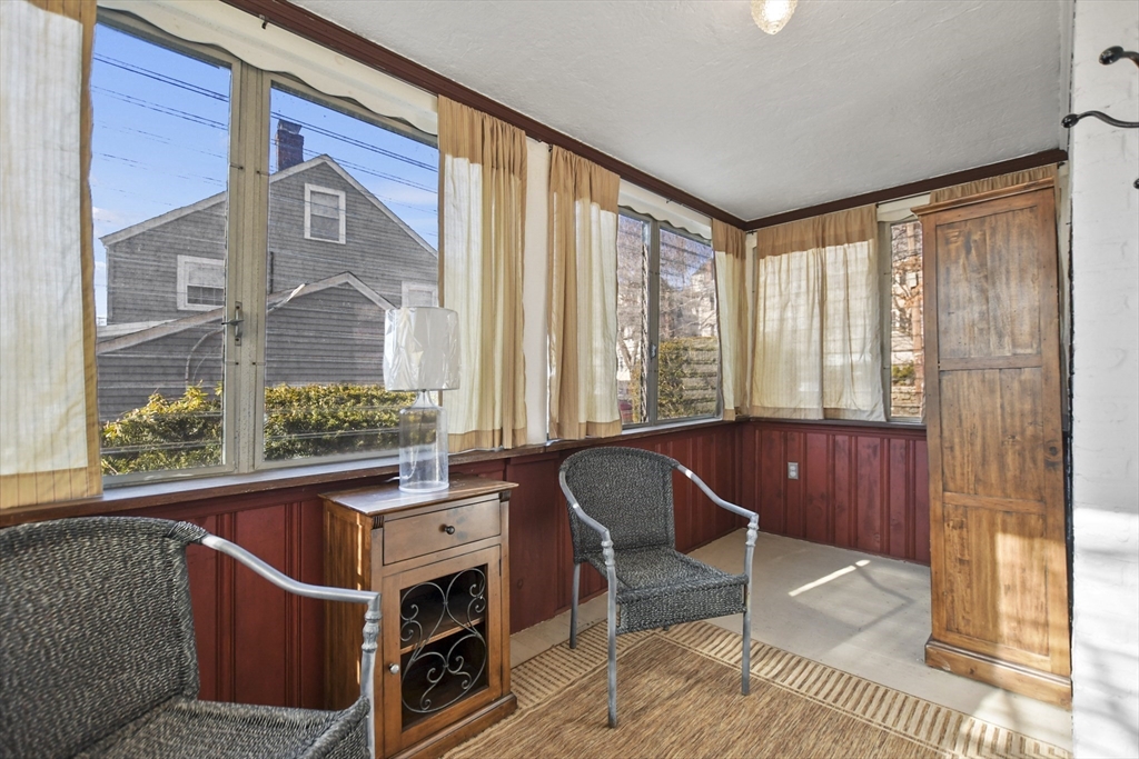 102 Channing Road Watertown, MA 02472 - Photo 33 of 40 a room with furniture and large windows