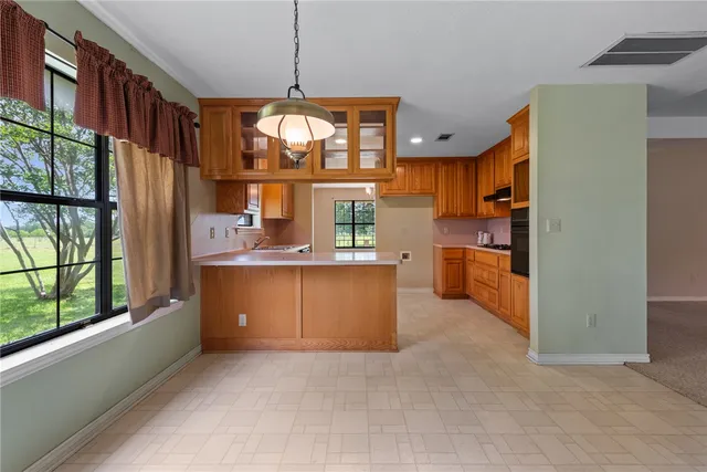 a view of kitchen and window