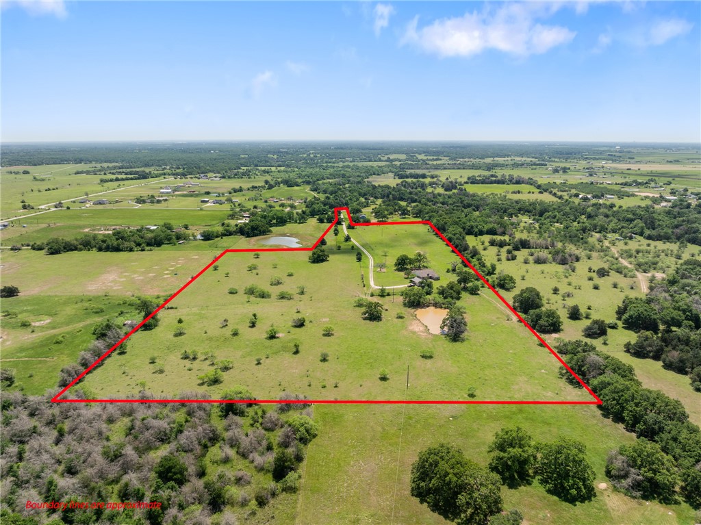 9393 Locke Road Bryan, TX 77808 - Photo 4 of 39 a view of a city