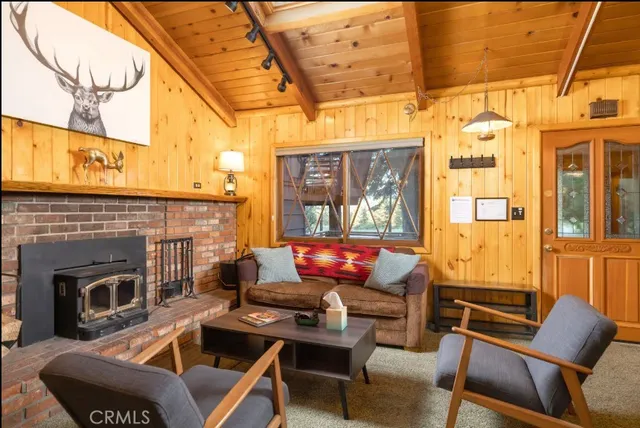 a kitchen with stainless steel appliances granite countertop a sink and a counter top space