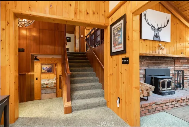 a kitchen with stainless steel appliances granite countertop a stove and a microwave