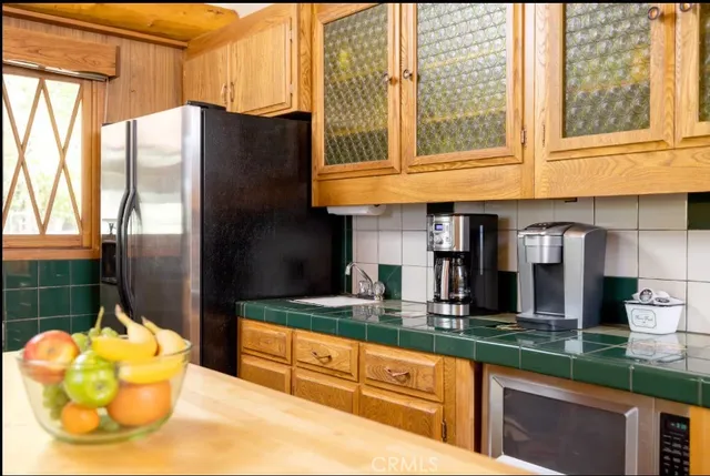 a bedroom with a bed and flat screen tv
