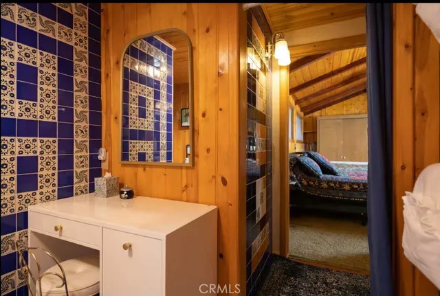 a view of a table and chairs in patio of the house