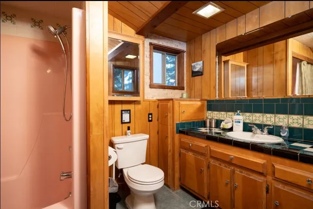 a bed room with a bed and furniture