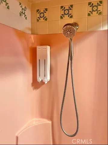 a view of a chairs and table in the patio