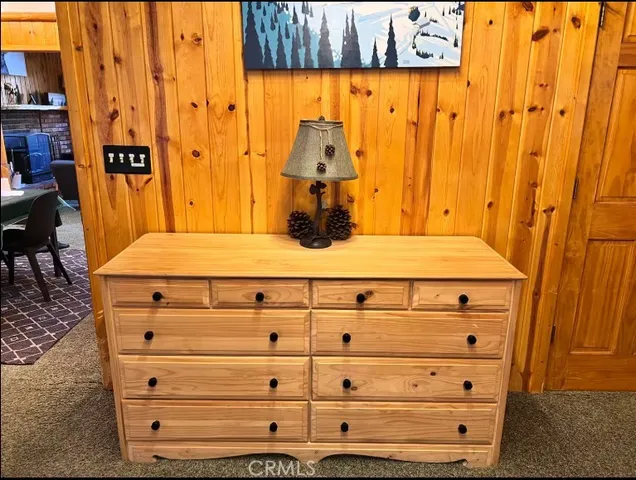 a view of a deck with couches table and chairs