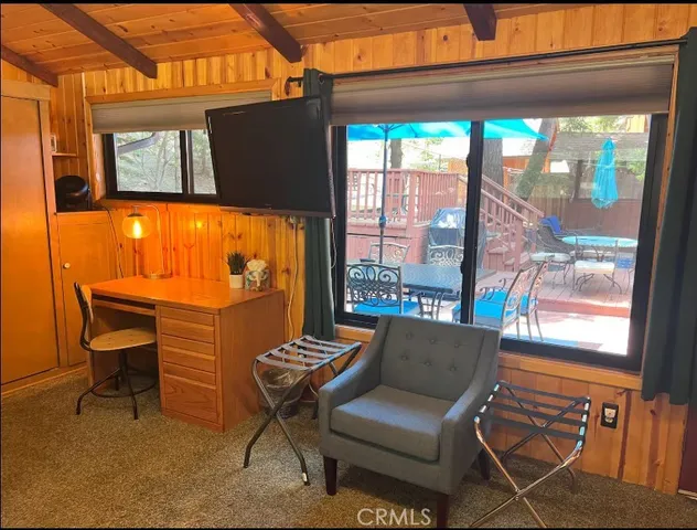 a view of a chairs and table in the patio