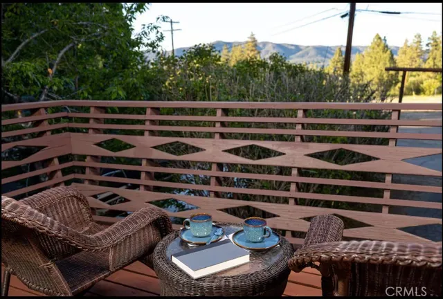 a room with furniture and a flat screen tv
