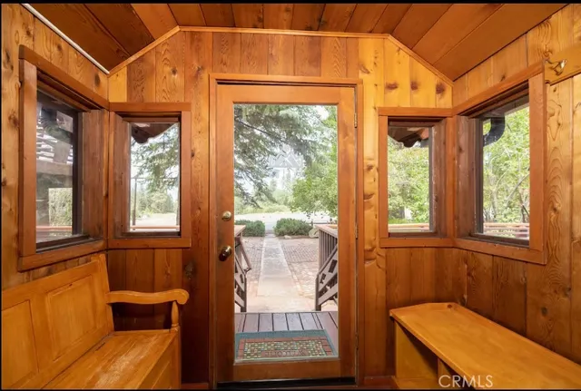 a kitchen with stainless steel appliances kitchen island granite countertop a sink and cabinets