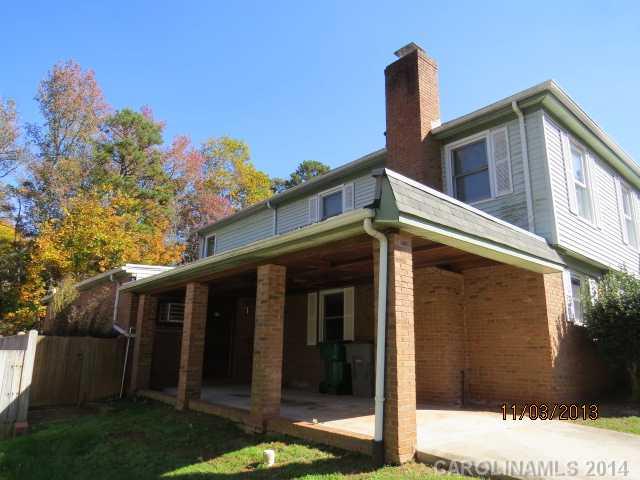 801 Riverwood Road Charlotte, NC 28270 - Photo 2 of 14 a front view of a house with garden