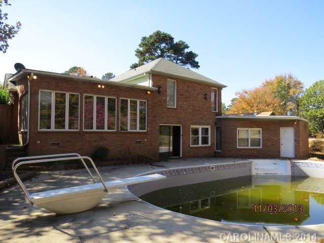 801 Riverwood Road Charlotte, NC 28270 - Photo 3 of 14 a view of a house with swimming pool
