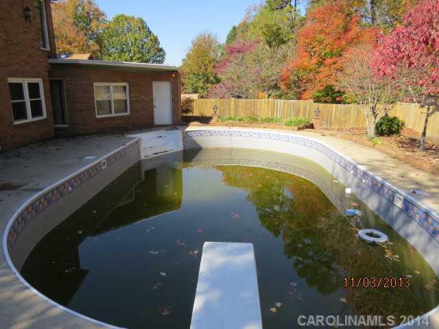 801 Riverwood Road Charlotte, NC 28270 - Photo 4 of 14 a view of swimming pool with a backyard