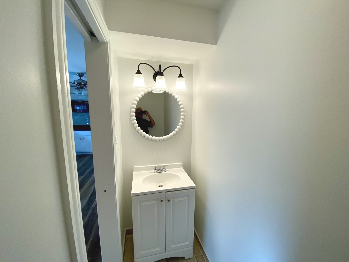 3515 173rd Place Lansing, IL 60438 - Photo 19 of 26 a bathroom with a sink and a mirror