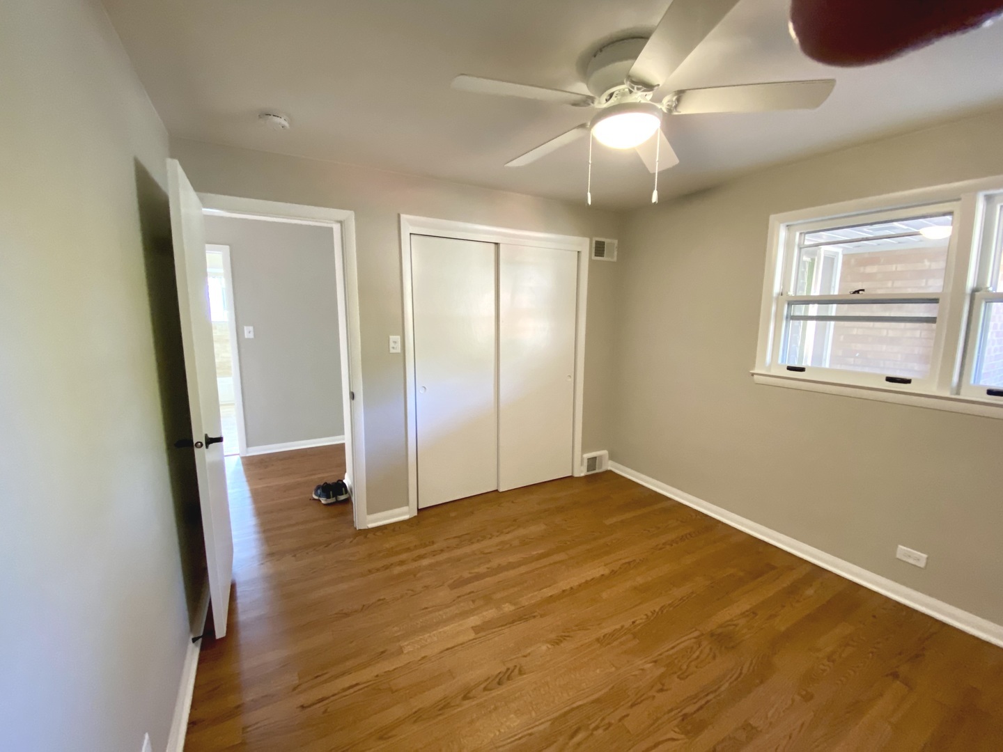 3515 173rd Place Lansing, IL 60438 - Photo 20 of 26 wooden floor in an empty room with a window