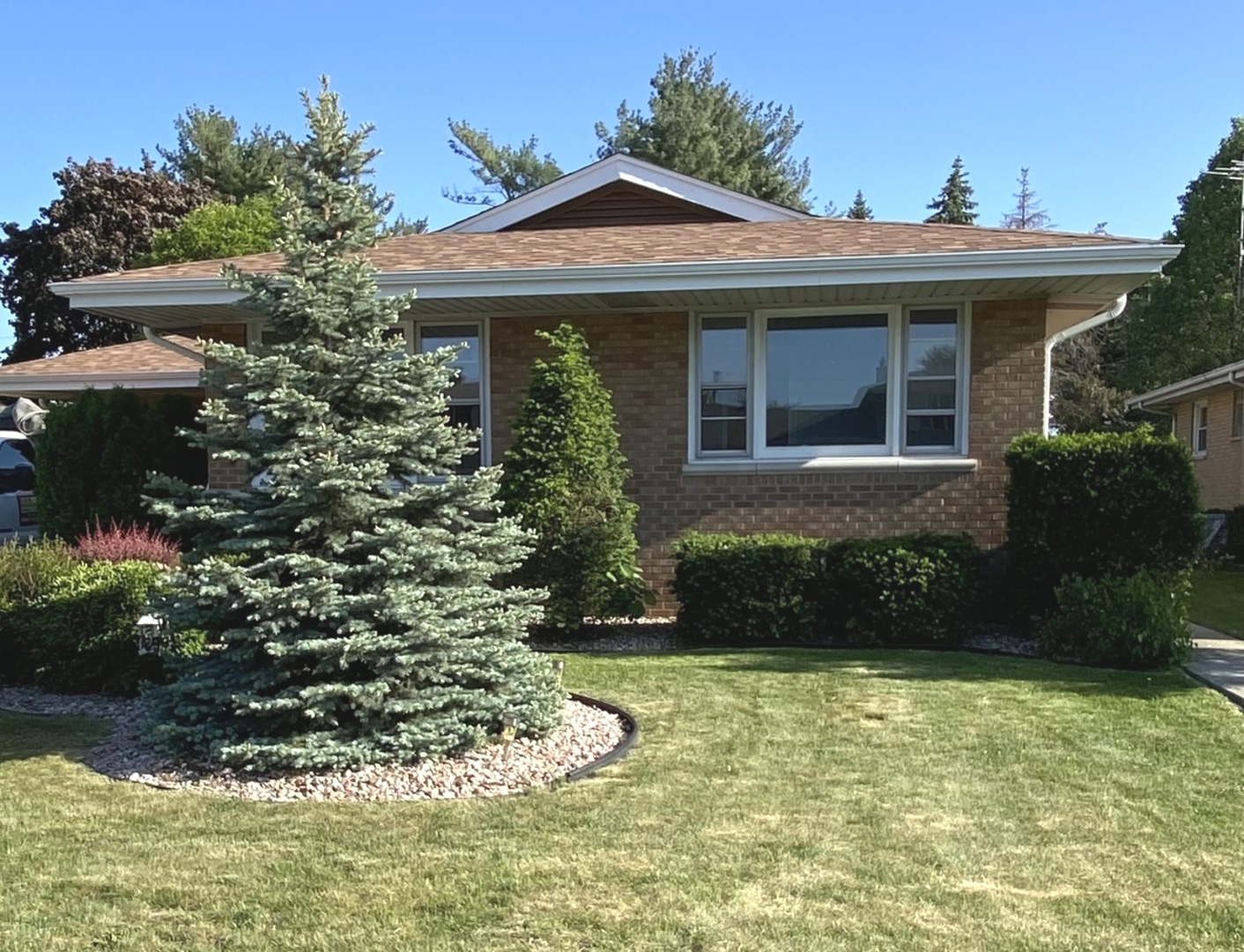 3515 173rd Place Lansing, IL 60438 - Photo 2 of 26 a front view of a house with a yard