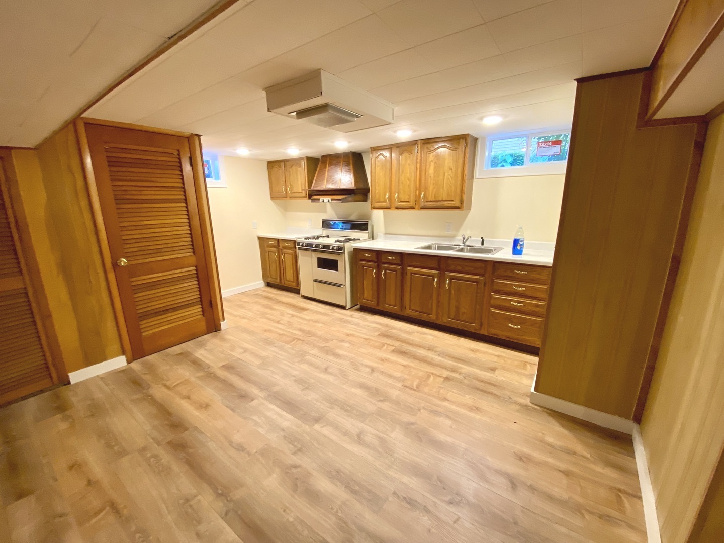 3515 173rd Place Lansing, IL 60438 - Photo 24 of 26 a large white kitchen with cabinets
